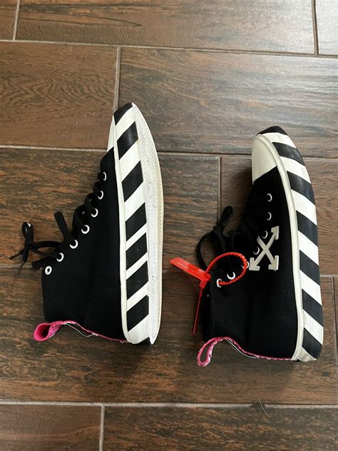 off white arrow on canvas